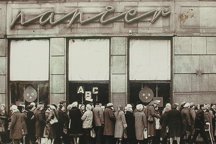 Queue to paper shop