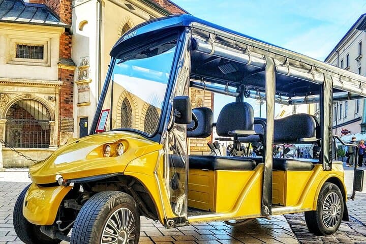 A glance at the Krakow Old Town from the deck of a electric golf cart