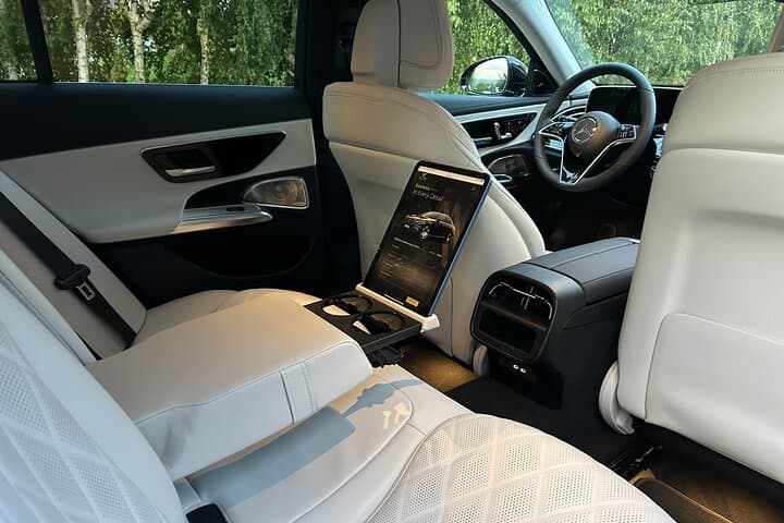 First-class interior of the Mercedes E-Class – premium comfort, reclining seats, and full control at your fingertips.